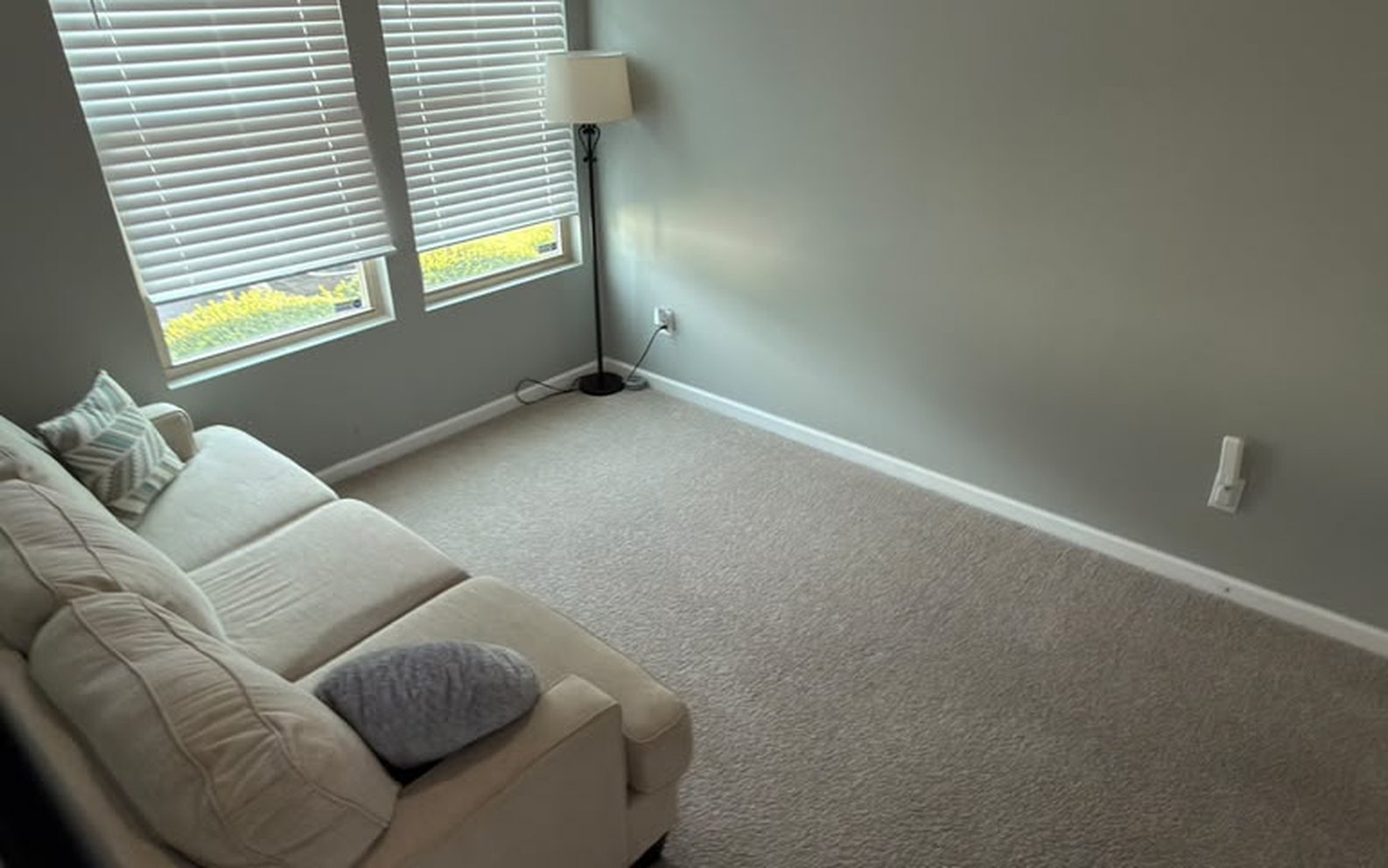 Light beige sofa after professional deep cleaning